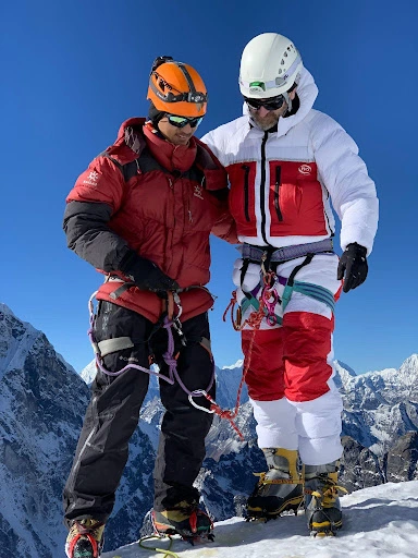 Ang helping a climber